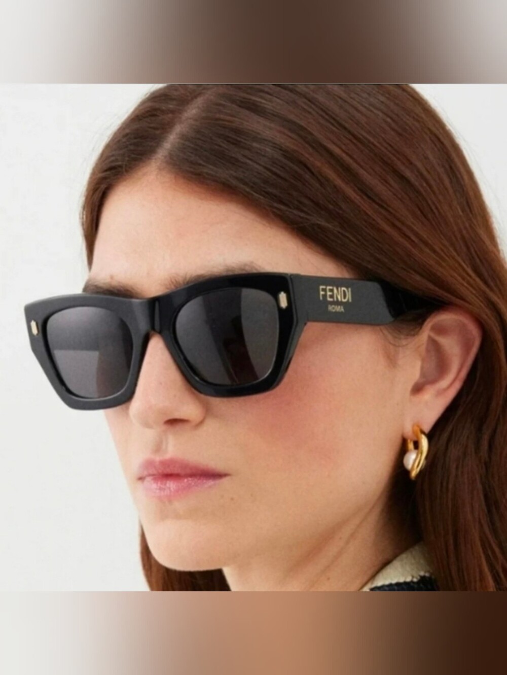 Fendi Black Cat-Eye Sunglasses with Subtle Gold Accents